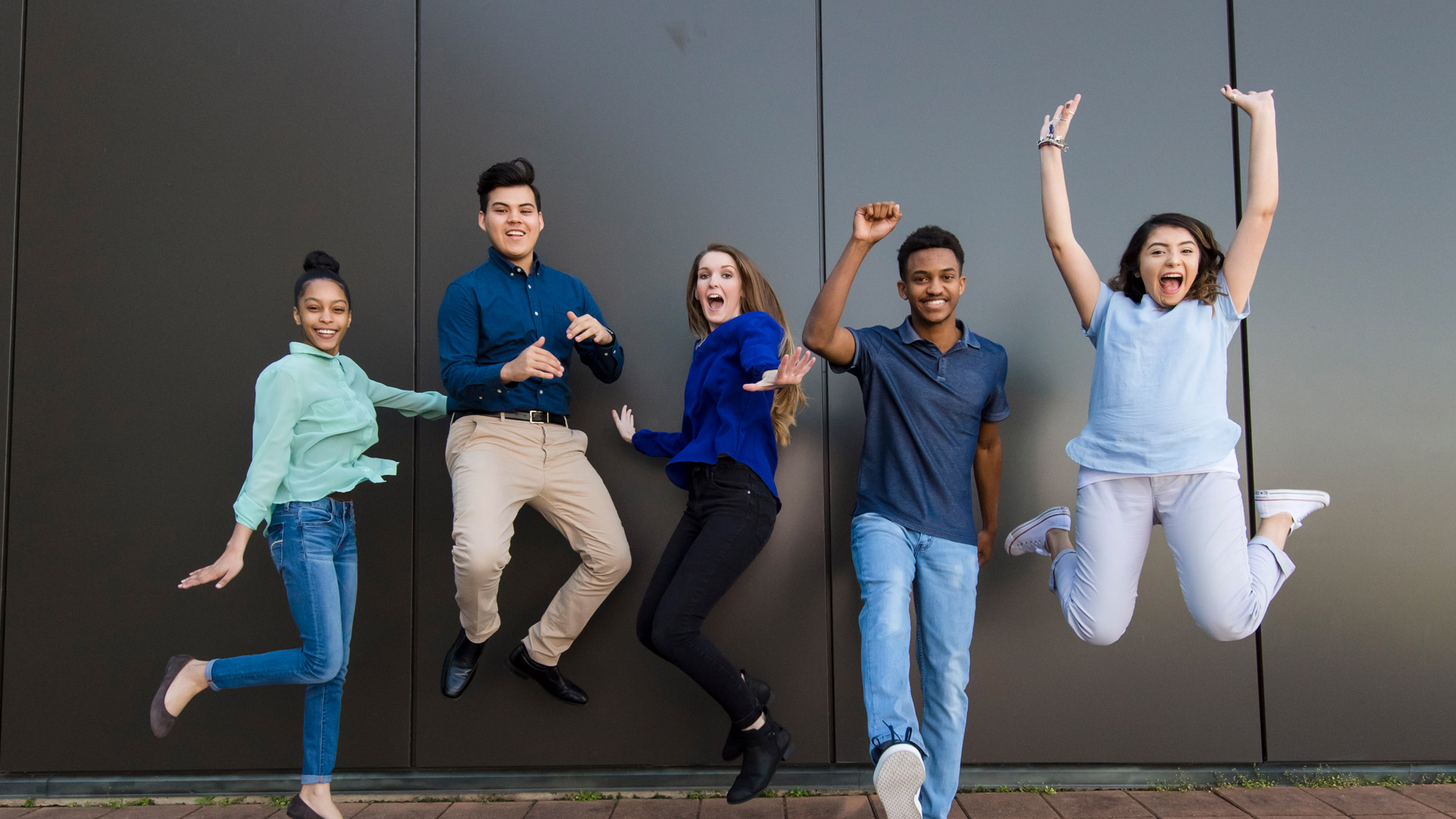 UHCL students leaping with excitement